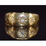 Edwardian 18ct gold ring set with three diamonds in star settings, Chester 1905, 2.7g, size P