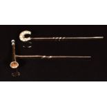 Edwardian 15ct gold stick pin in the form of a horseshoe (0.9g) set with seed pearls and a 9ct