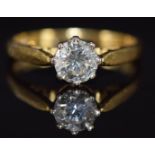 An 18ct gold ring set with a round cut diamond of approximately 1ct, 4.3g, size R