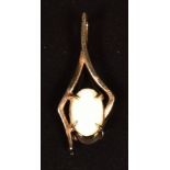 A 9ct gold pendant set with an opal, 0.5g