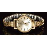 Tissot 9ct gold ladies wristwatch with black hands and baton hour markers, silver dial and signed 17