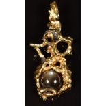 A 1970s 18ct bi-coloured gold pendant set with a quartz star cabochon, London 1973, maker SGC