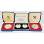 Three Royal Mint cased coins comprising 1989 £2 proof silver Tercentenary pair with certificate