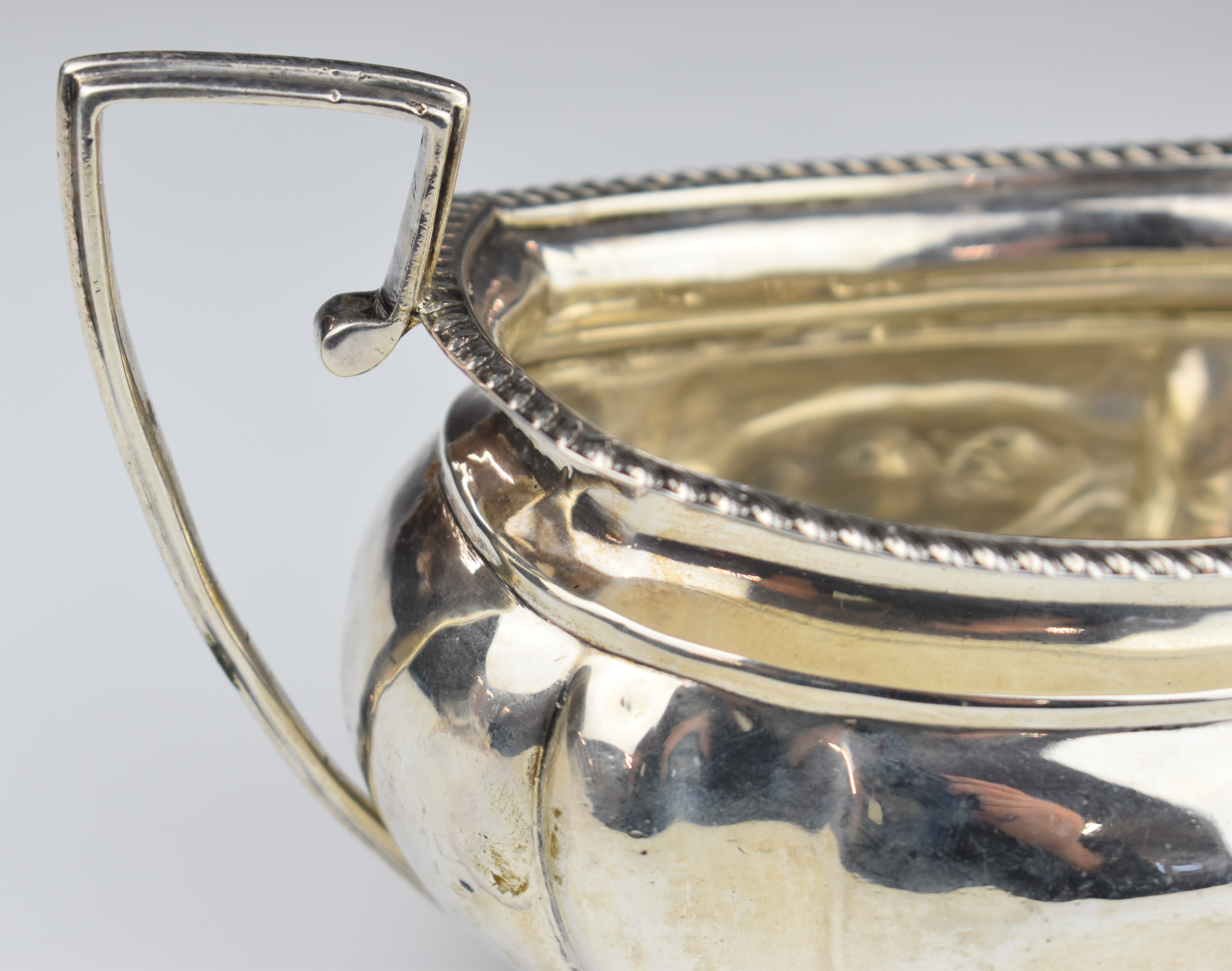 Early 20th century hallmarked silver twin handled sugar bowl with gadrooned edge, raised on four - Image 6 of 6