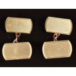 A pair of 9ct gold cufflinks with engine turned decoration, 4.6g