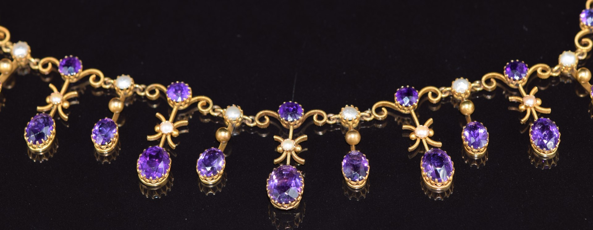 Edwardian 9ct gold necklace set with seven round cut amethysts, fifteen oval cut amethysts, split - Image 2 of 2