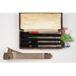 Cased set of four silver bridge or similar pencils, each marked sterling silver, length of case