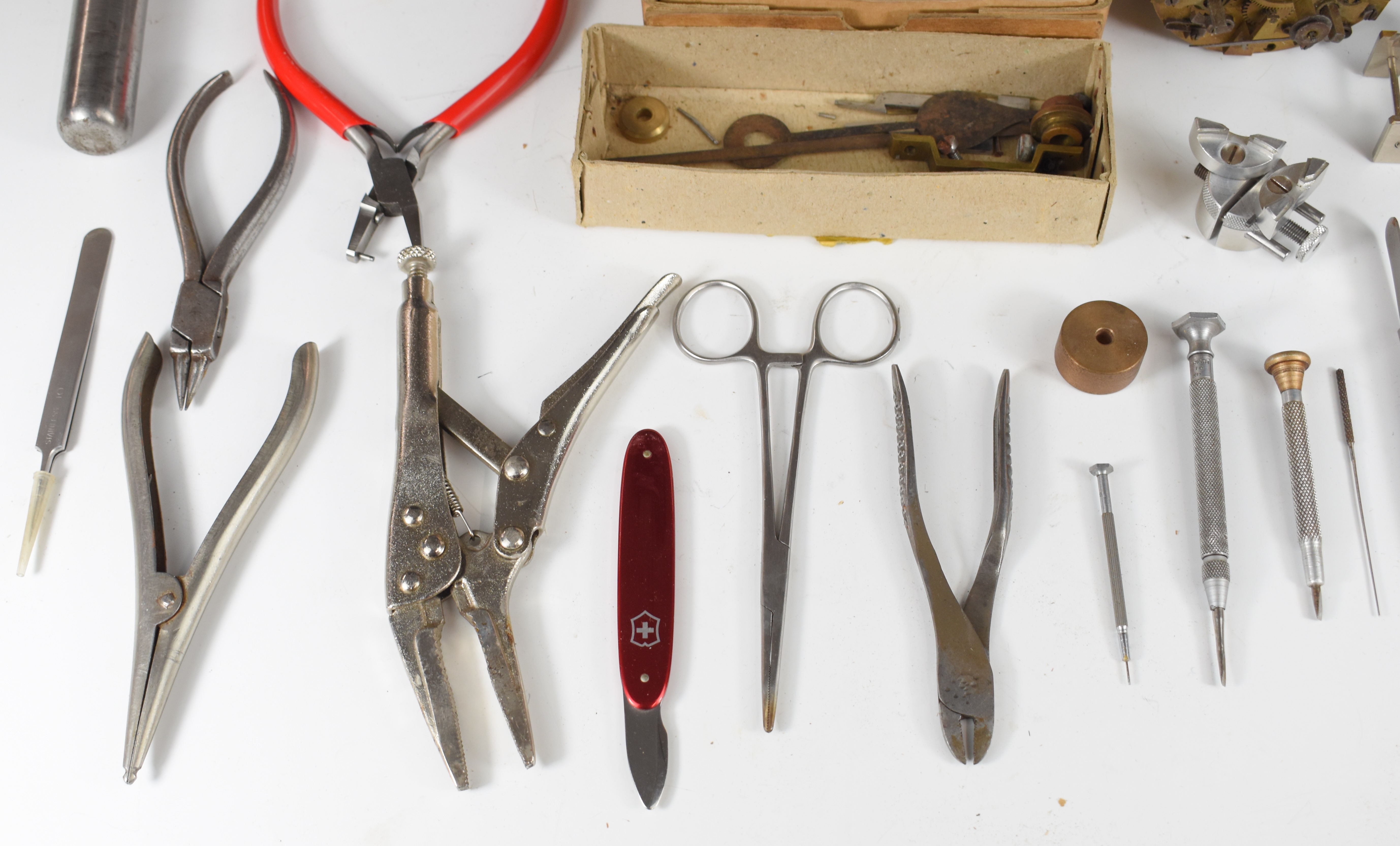 Collection of clock parts, keys, tools, needle files, engraver's wax, clamps etc, in three trays - Image 19 of 21