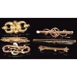 Art Nouveau 9ct gold brooch set with enamel and seed pearls, four c1910 9ct gold brooches (10g)