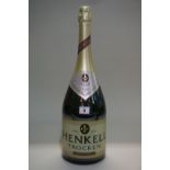 A 300cl jeroboam bottle of Henkell dry-sec sparkling wine.