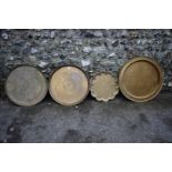 Four various Islamic brass trays.