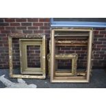 Seven old giltwood picture frames.