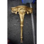 An antique giltwood console table, (lacking top), 66cm wide x 95cm high.