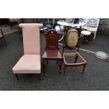 An antique mahogany hall chair; together with a tapestry occasional chair, (a.f.) and a nursing