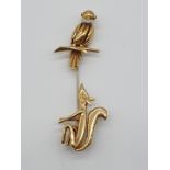(NB) A vintage French yellow metal jabot pin, depicting an Aesop's fable 'The Fox and the Crow',