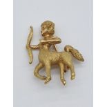 (NB) A 1960s French yellow metal Sagittarius brooch, modelled as a centaur with bow, stamped with