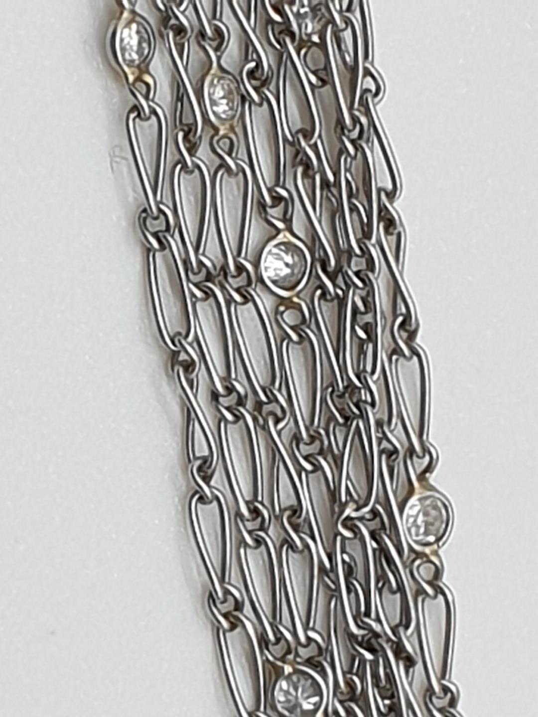 (NB) An unusual pre war chain, interspersed with eighteen collet set diamonds, approx 100cm long, - Image 2 of 3