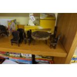 An eleven piece wooden doll's house furniture set; together with an old silver mounted blackthorn
