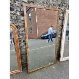 A large rectangular wall mirror, 176 high x 99.5cm wide.