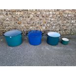 A set of four enamel pots, one with lid.