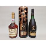 Two 70cl bottles of cognac, comprising: Remy Martin VSOP, in metal tube; and Hennessy. (2)