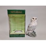 A 20cl Whyte & Mackay Royal Doulton 'Snowy Owl' whisky decanter, with contents, in oc.