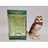 A 20cl Whyte & Mackay Royal Doulton 'Short Eared Owl' whisky decanter, with contents, in oc.