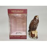 A 20cl Whyte & Mackay Royal Doulton 'Buzzard' whisky decanter, with contents, in oc.