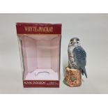 A 20cl Whyte & Mackay Royal Doulton 'Peregrin Falcon' whisky decanter, with contents, in oc.