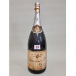 A 150cl magnum bottle of Lambert & Cie extra dry NV champagne.