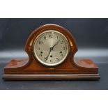 An Edwardian mahogany and inlaid Wellington clock, chiming on five straight gongs, 44cm wide, (no