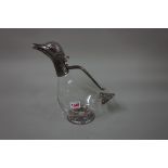 A clear glass and plated metal novelty duck claret jug, 27cm high.