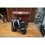 A pair of Carl Zeiss 'Dekarem' 10x50 binoculars, in case.