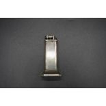 A vintage Dunhill silver plated 'tallboy' table lighter, 10cm high.
