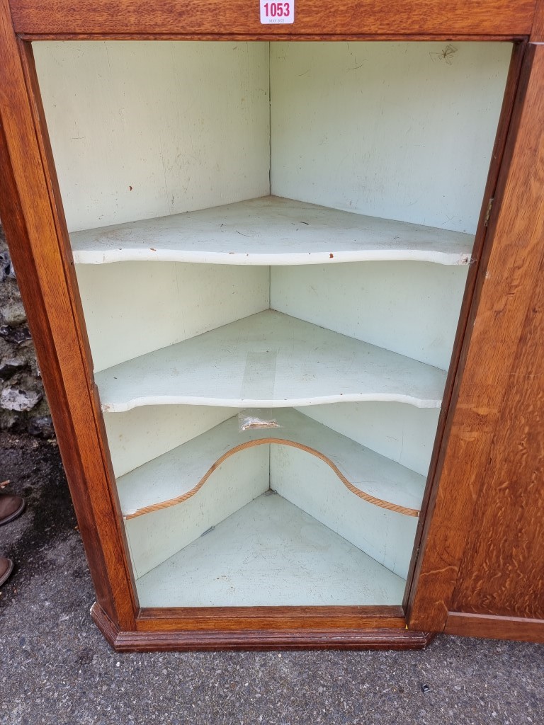 A George III oak hanging corner cupboard, 105cm high x 72cm wide. - Image 3 of 3