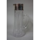 A good cut glass and sterling mounted lemonade jug, 30.5cm high.