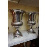 A large pair of modern plated metal Campana urns, 38.5cm high.