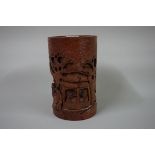 A Chinese carved bamboo brush pot, 18cm high.
