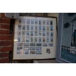 A framed set of fifty reproduction 'Deep Sea Diving' cigarette type cards.