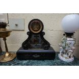 A 19th century slate and marble mantel clock, 45.5cm high, with pendulum and winding key.