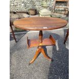 A reproduction two tier occasional table.