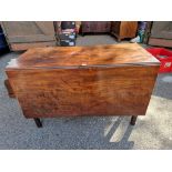 An 18th century mahogany gateleg table, 115cm wide x 52cm deep.