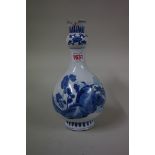 A Chinese blue and white garlic-neck bottle vase, probably Kangxi, 24cm high, (damage to top rim).