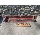 A carved oak wall shelf; together with a small wood carving.