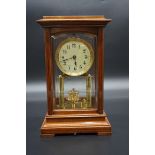 A mahogany four glass anniversary clock, by Gustav Becker, 31cm high.