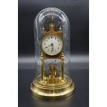 A brass 400 day timepiece, by Gustav Becker, with glass dome, 31cm high.