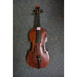 An antique Continental violin, labelled 'GP & S' and numbered 506, with 14in two-piece back.