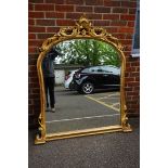 A large Victorian style carved giltwood frame overmantel mirror, 153 x 135cm.
