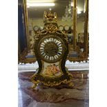 A good 19th century green tortoiseshell, boulle, and porcelain mantel clock, the movement signed '