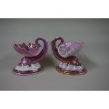 A pair of Fischer and Mieg pink lustre dolphin and shell sweetmeat dishes, 12.5cm high.